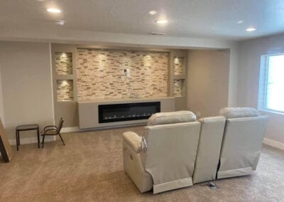 Small Home theater designed by Utah basement builder